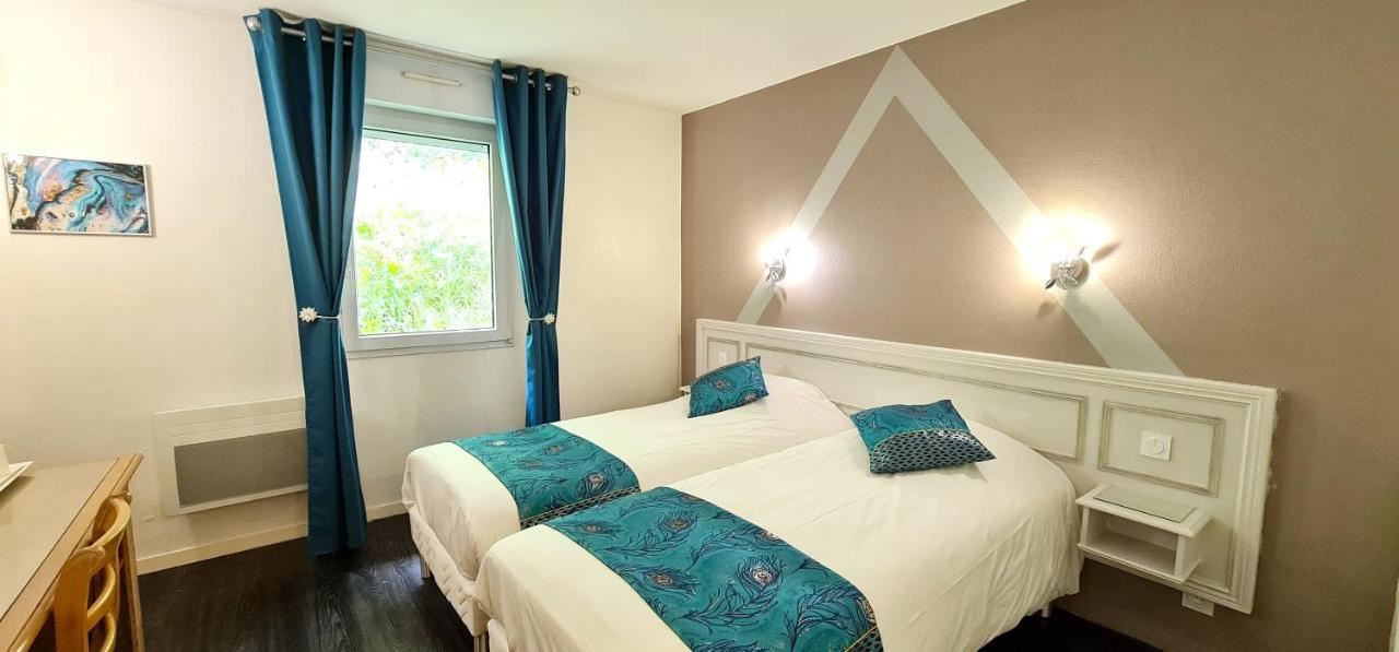 Fasthotel Oloron Hostellerie Du Paon Blanc Lurbe-Saint-Christau ภายนอก รูปภาพ